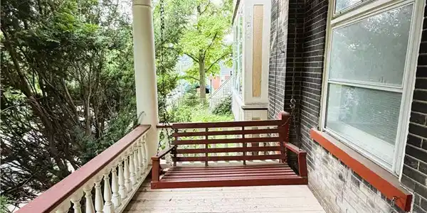 Image 3: Quintessential porch swing, on the east side of po