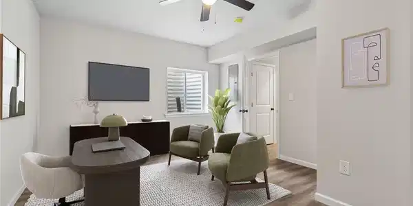 Image 3: Well-lit and functional, this versatile room offer