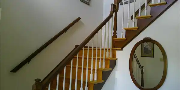 Image 4: Elegant hardwood staircase with white risers and s