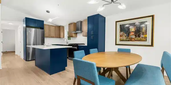 Image 2: Smooth wood floors flow seamlessly through this op