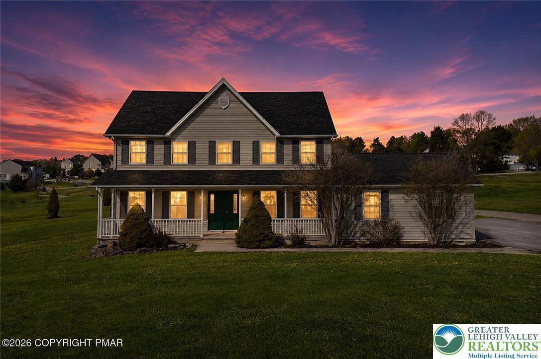 Image 3: An inviting front porch welcomes you to this class