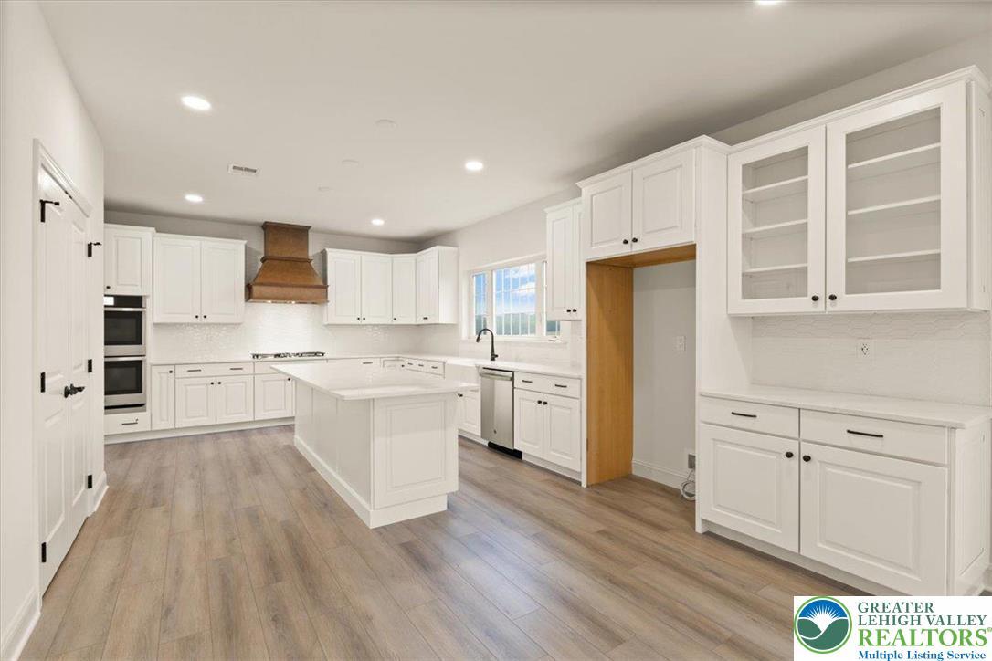 Image 4: not actual home, photo of previously built home