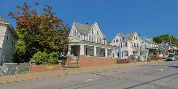 Image 2: Classic multi-story architecture stands prominentl