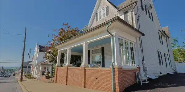 Image 3: Classic exterior architectural detailing frames th