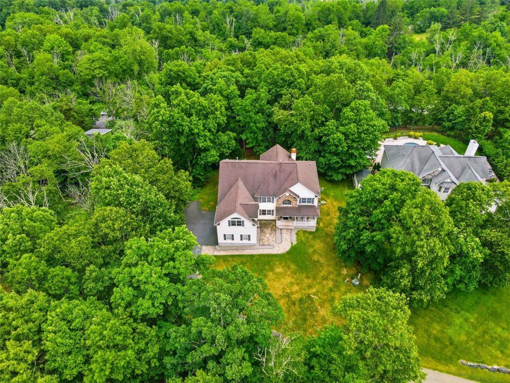 Image 3: Perched amidst a verdant landscape, this secluded
