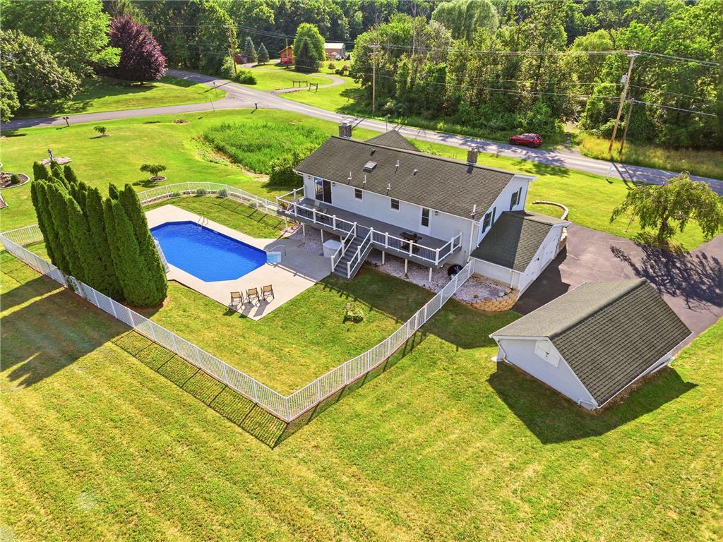 Image 2: An inviting pool and two story trex deck complemen