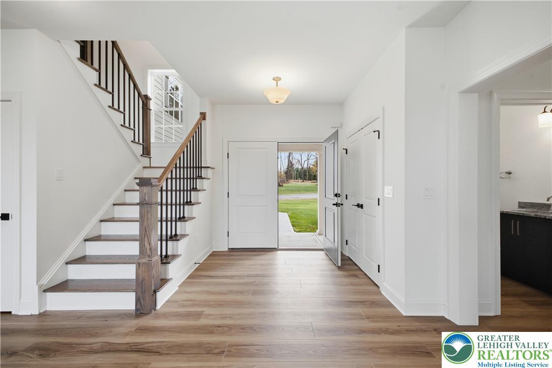 Image 4: not actual home, photo of previously built home