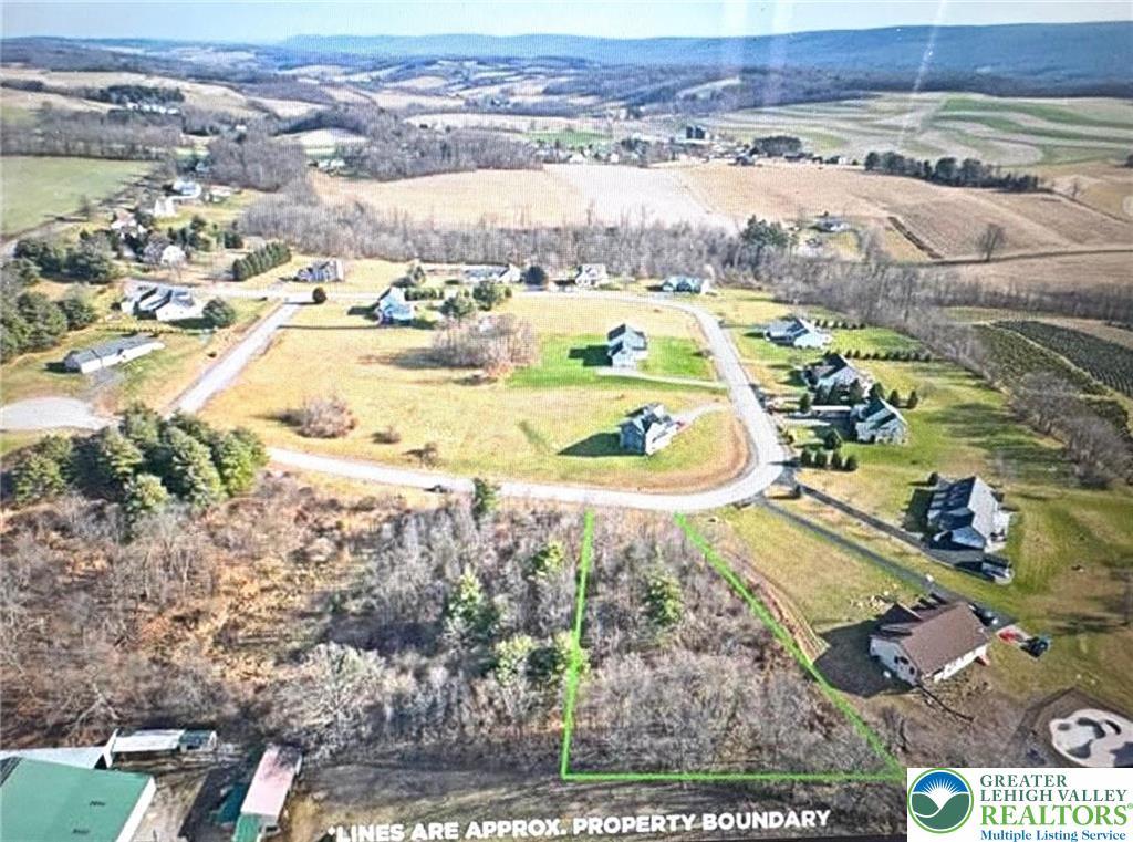 Image 4: This aerial view showcases a desirable residential