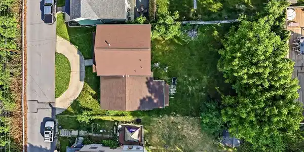 Image 2: An aerial perspective reveals a verdant landscape