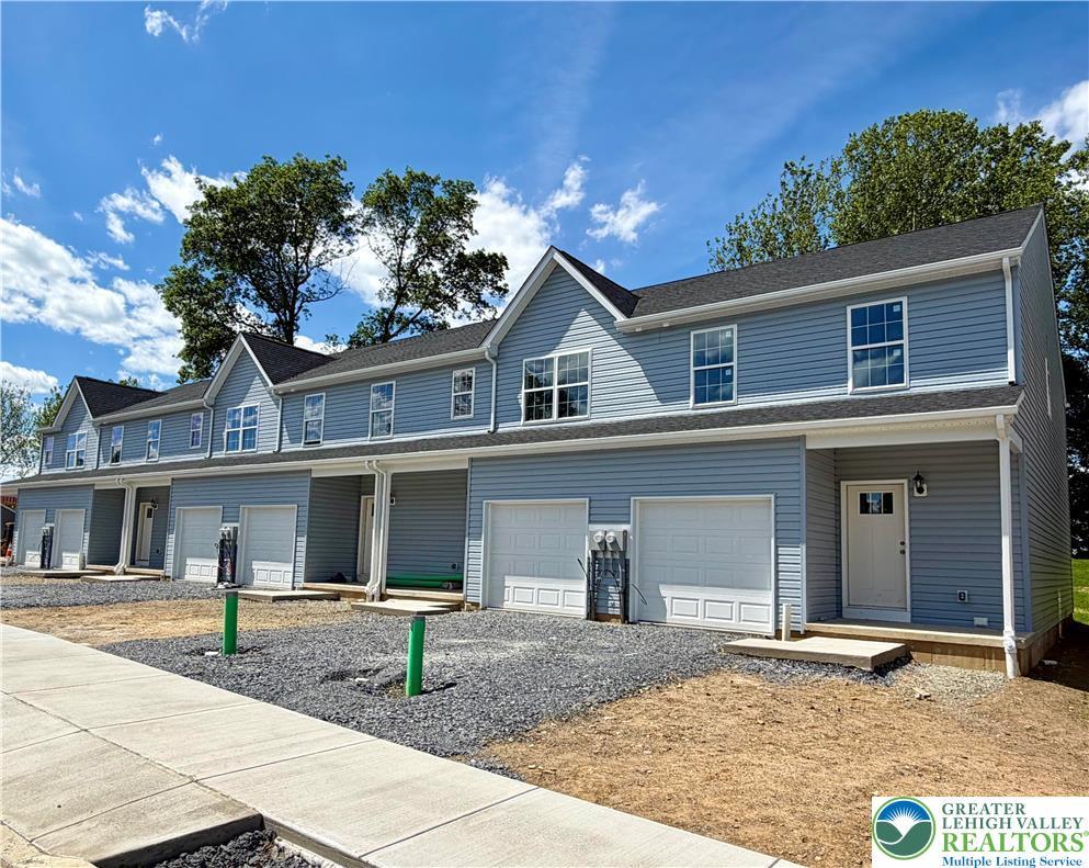 Image 2: These newly constructed residences offer attached