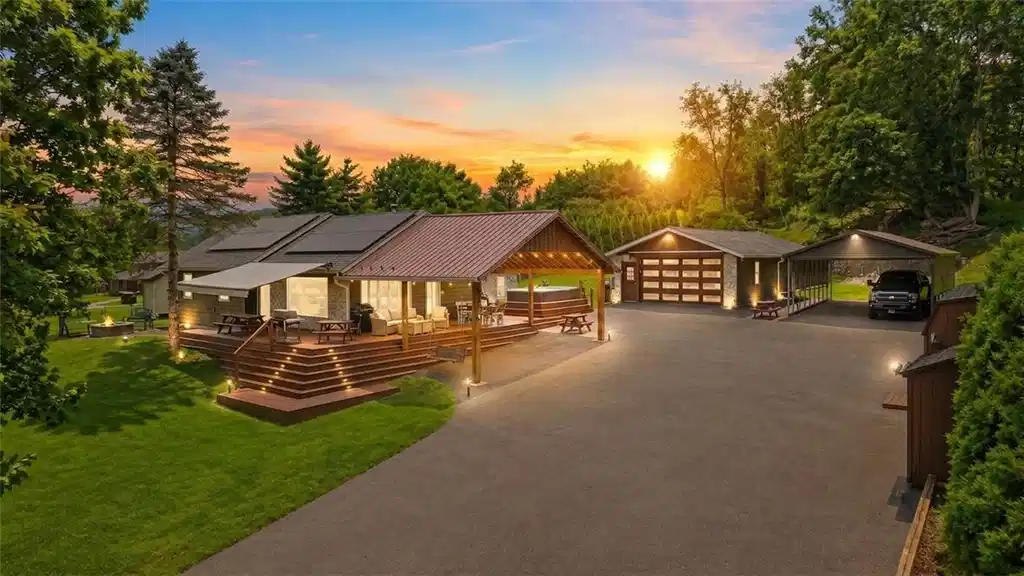 Image 1: An expansive driveway leads past the multi-tiered