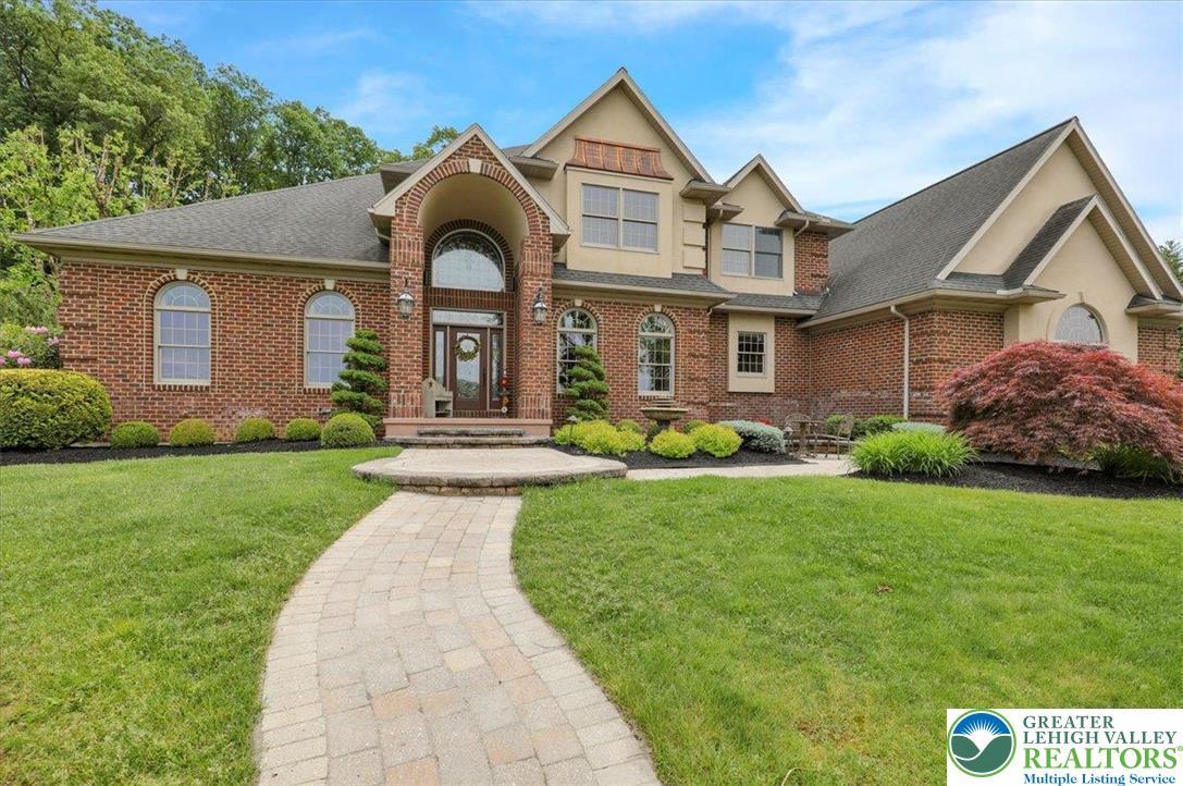 Image 2: A grand brick facade with arched windows welcomes