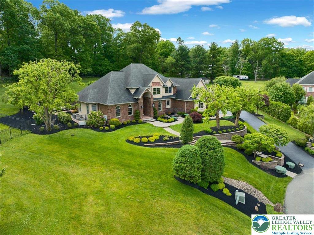 Image 3: A grand residence boasting brick construction, met