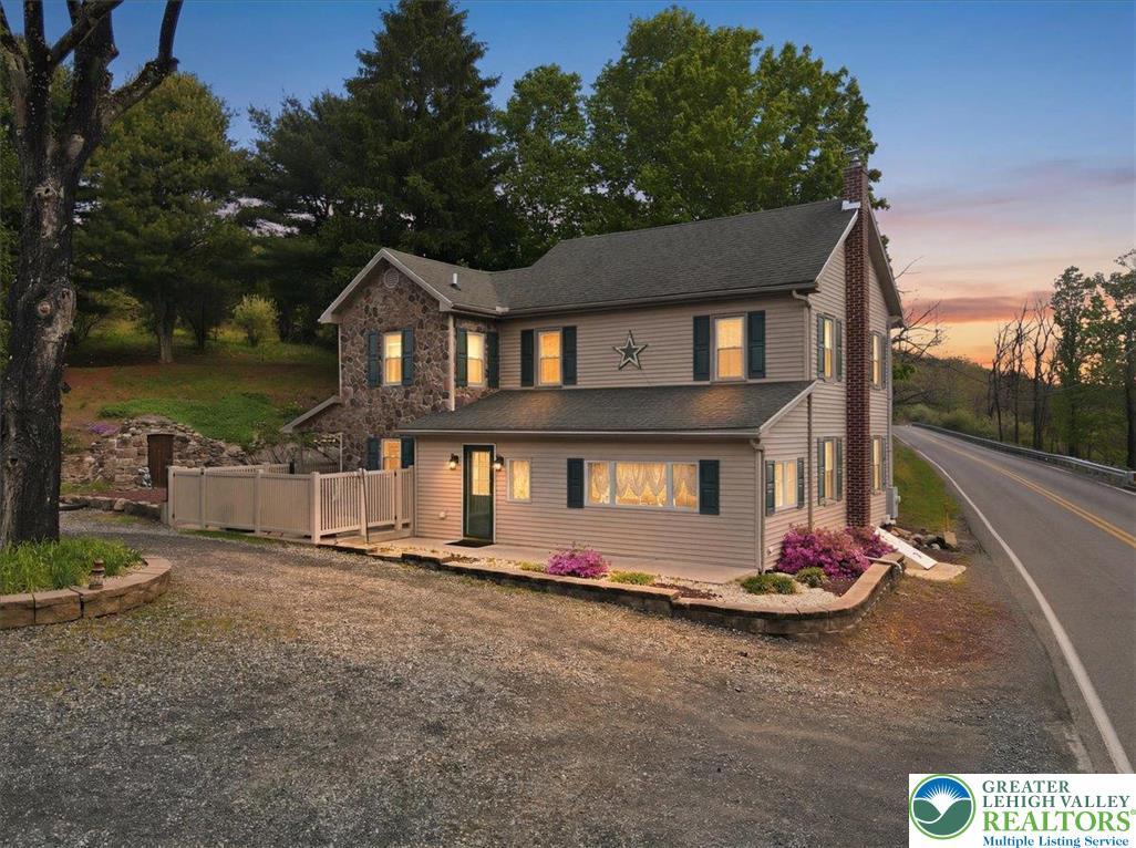 Image 2: This charming home offers a perfect blend of natur