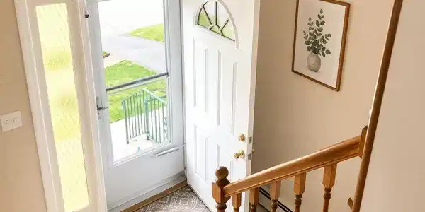 Image 2: A welcoming entry invites guests inside, showcasin