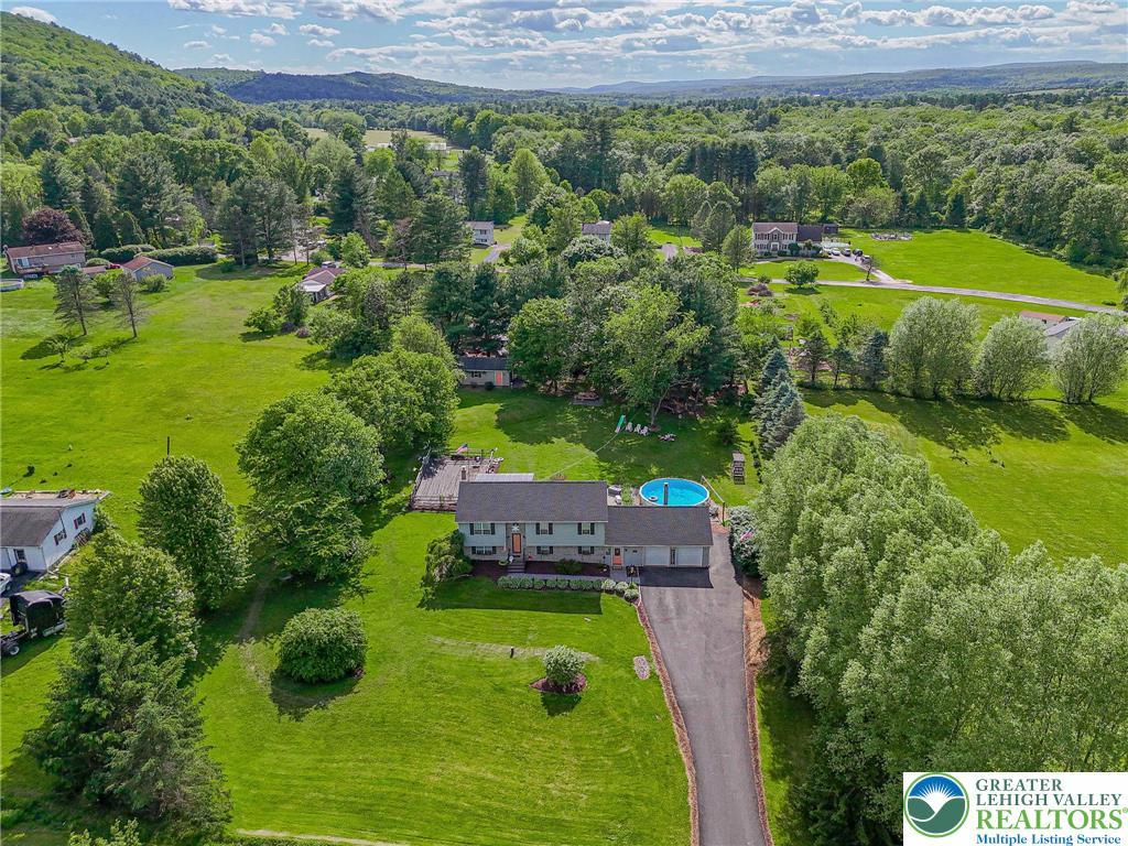 Image 2: An aerial perspective reveals a serene countryside