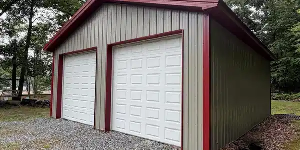 Image 2: A well-maintained metal storage building offers pr