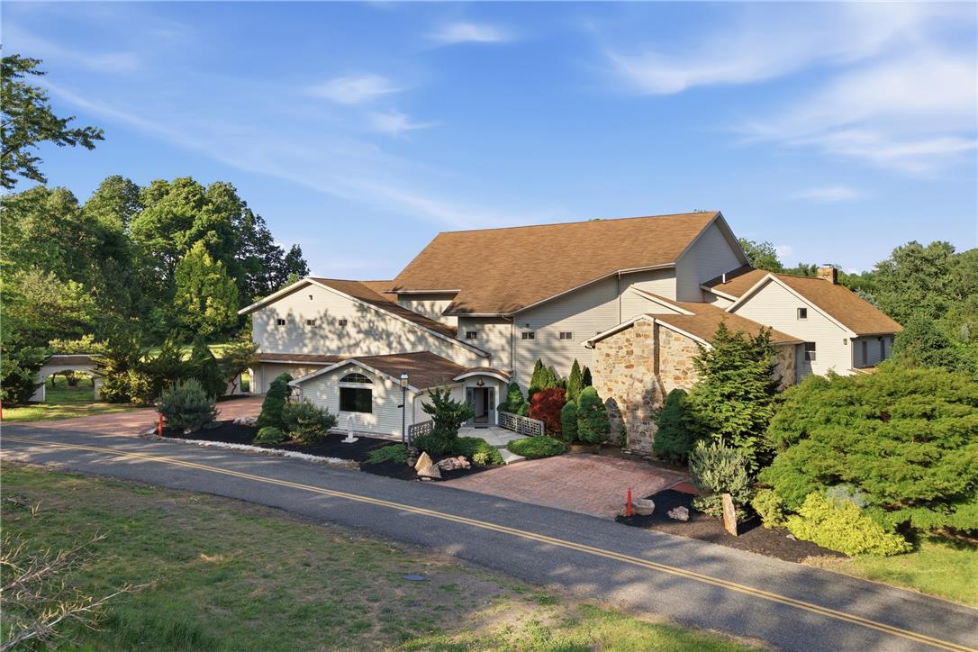 Image 1: Architectural marvel with a distinctive multi-leve