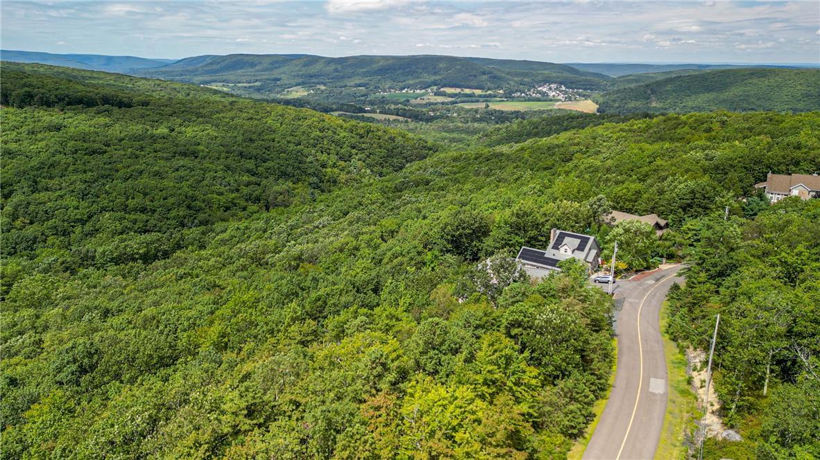 Image 2: Nestled among hills, a secluded residence offers t