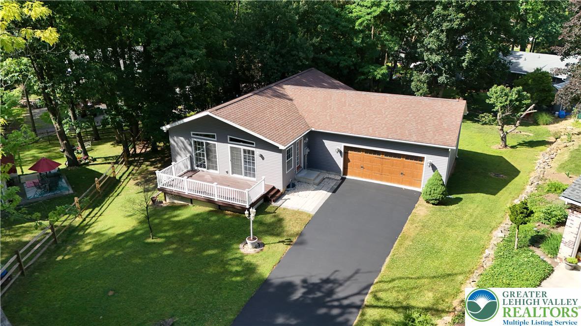Image 3: An inviting exterior with a well-maintained lawn a