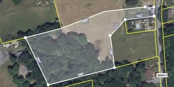 Image 2: An aerial plat map outlines the expansive boundari