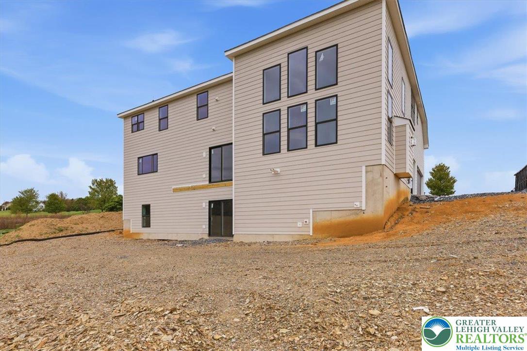 Image 2: A newly constructed residence features modern sidi