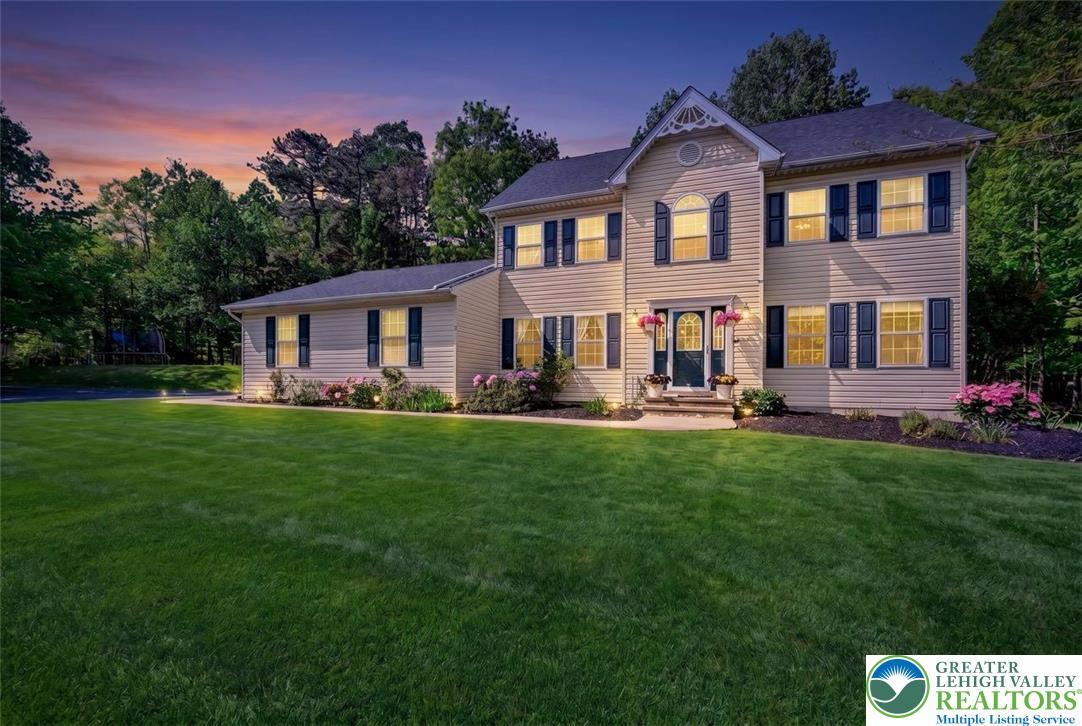 Image 3: Dusk Colonial View on Corner Lot