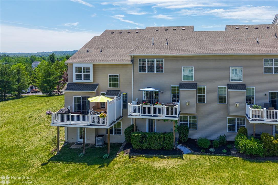 Image 4: Dual elevated decks offer private outdoor living s