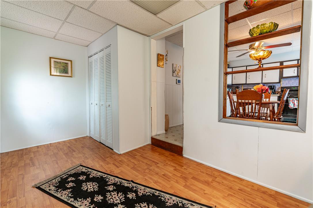 Image 4: This interior space boasts durable flooring and of