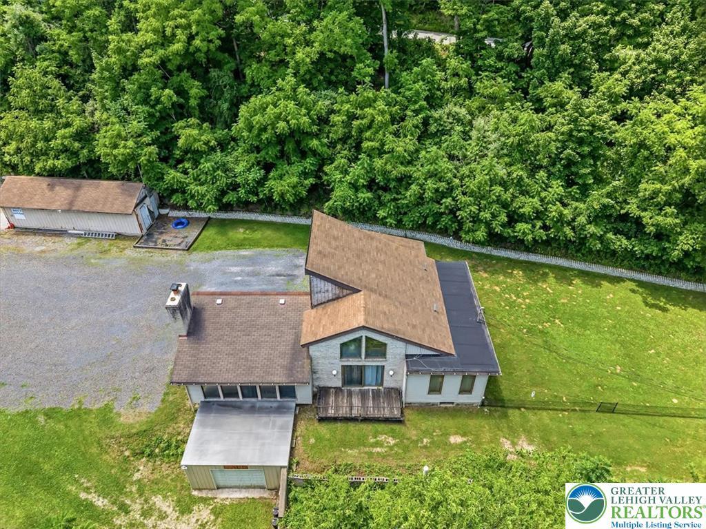 Image 2: An aerial perspective reveals a secluded residence