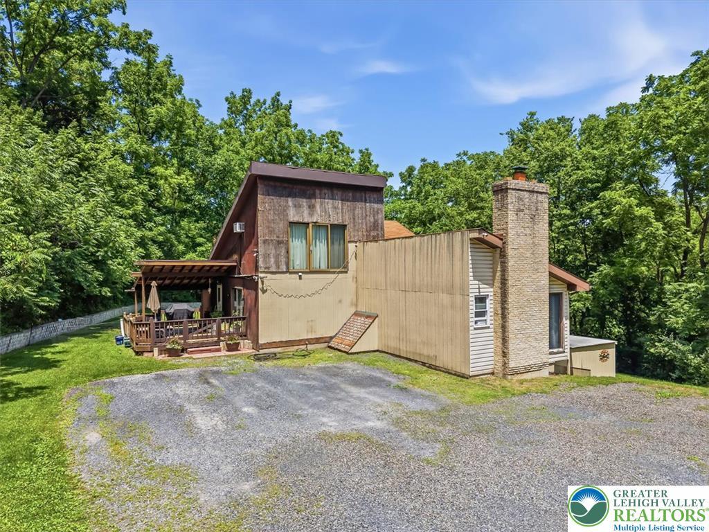 Image 3: A charming rustic retreat nestled amongst abundant