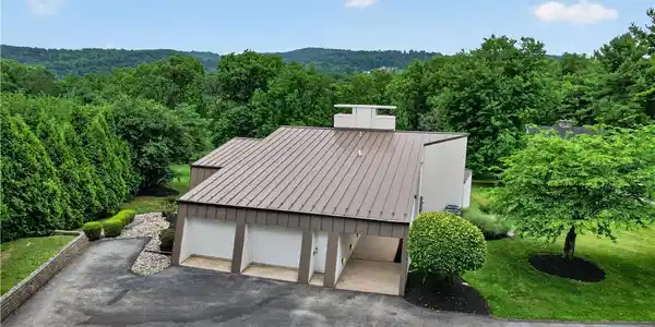 Image 3: Perched on a hill, this distinctive dwelling offer