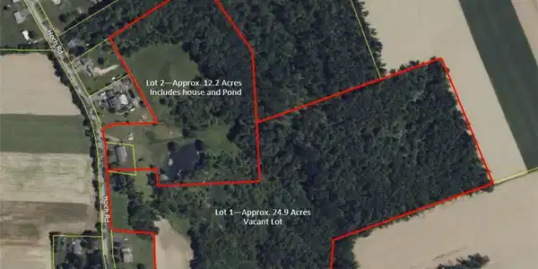 Image 3: An aerial perspective reveals the expansive land p