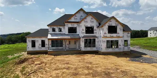 Image 2: A newly constructed residence, wrapped in weather-