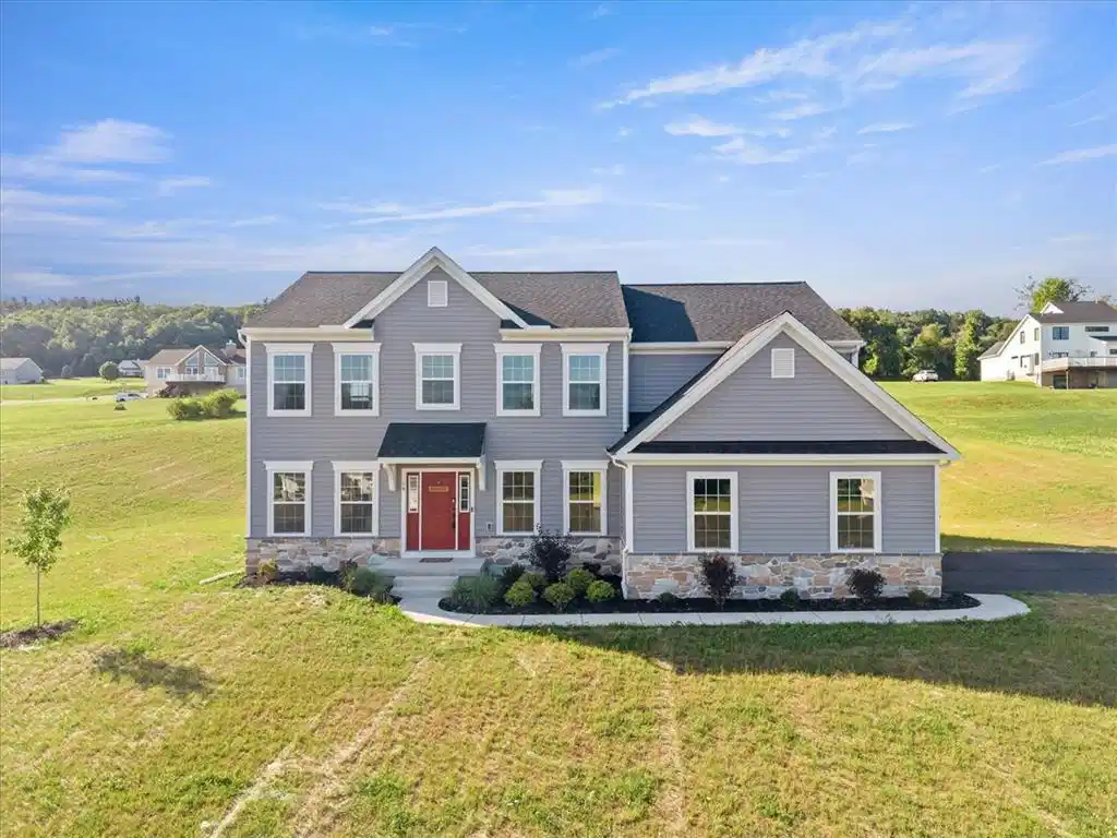 Image 1: A well-appointed residence featuring a charming re