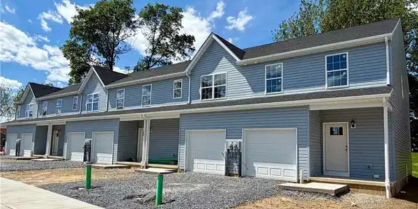 Image 2: These newly constructed townhomes offer a modern f