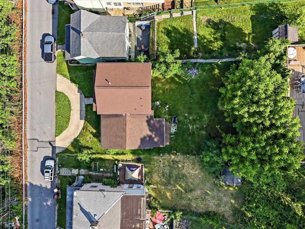Image 2: An aerial perspective reveals a verdant landscape