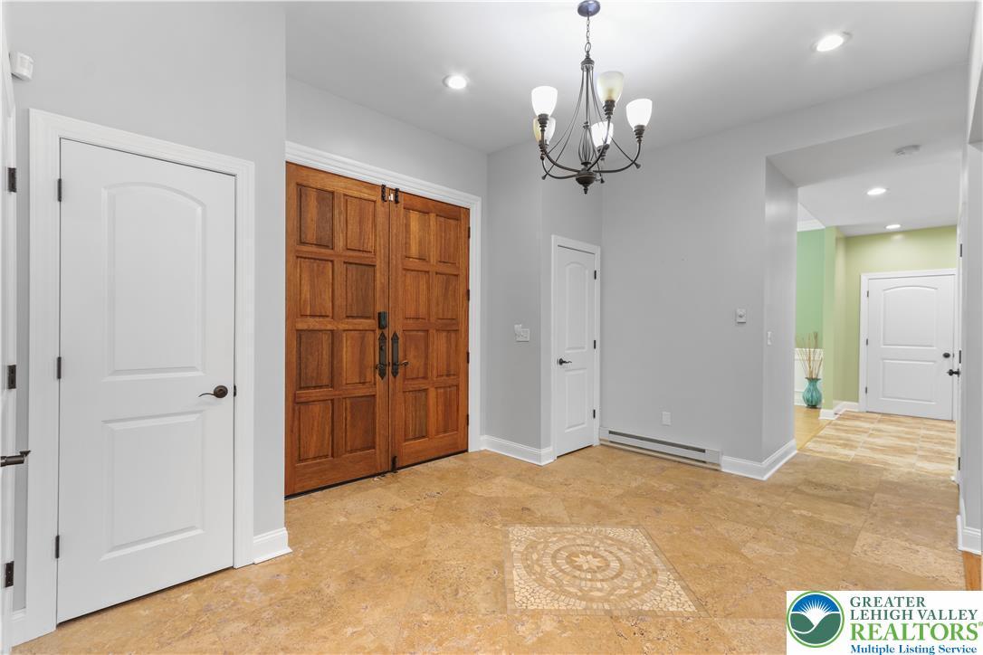 Image 4: Enter through grand double doors into a welcoming