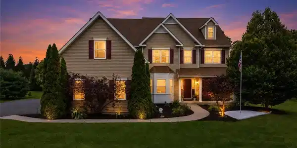 Image 2: Illuminated windows and exterior lighting highligh