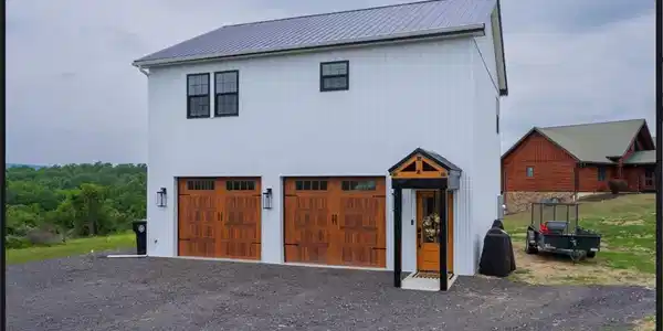 Image 3: Metal roofing and board and batten siding frame th