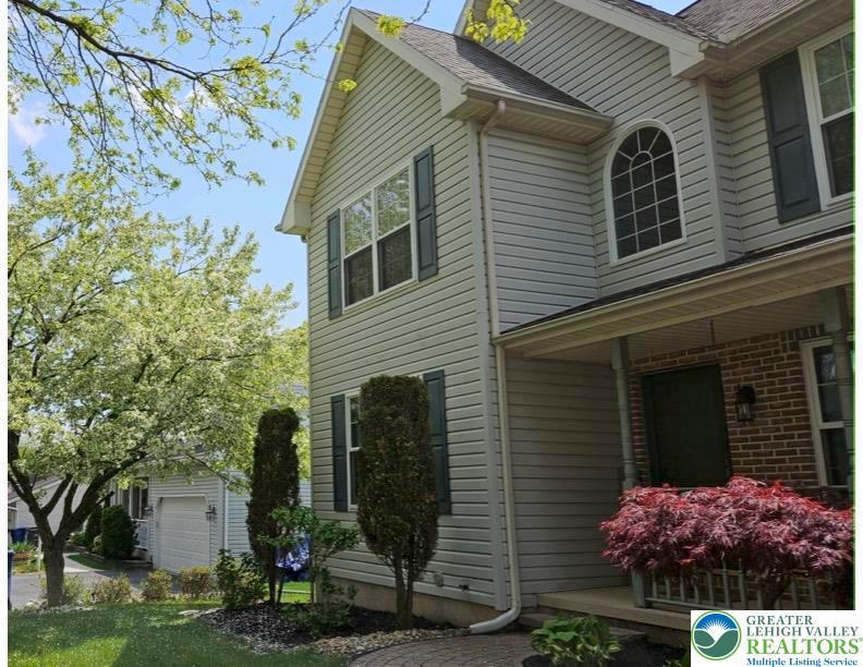 Image 2: front angle of house