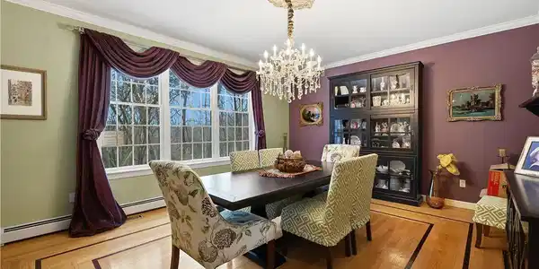Image 3: Elegant hardwood flooring sets the stage for forma