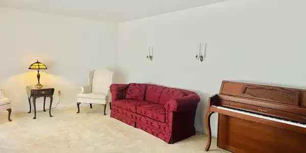 Image 4: Well-maintained carpeting provides comfort in this