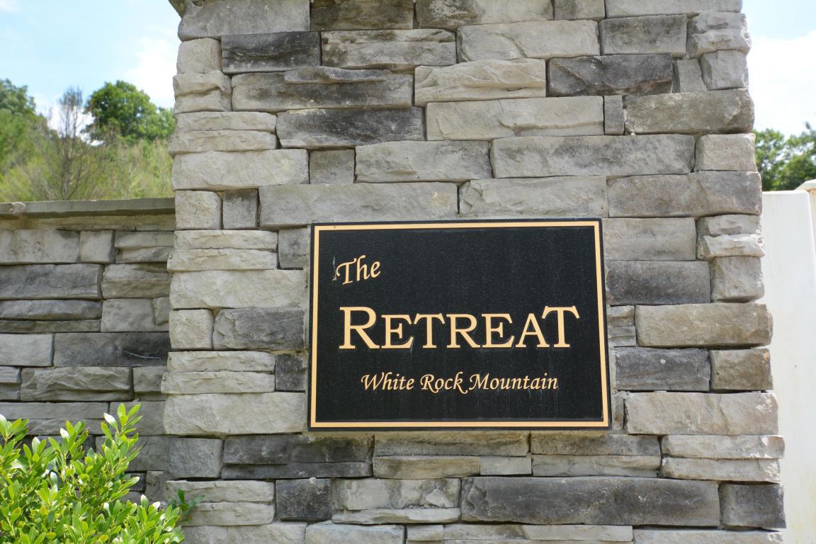 Image 3: the Retreat SIGN