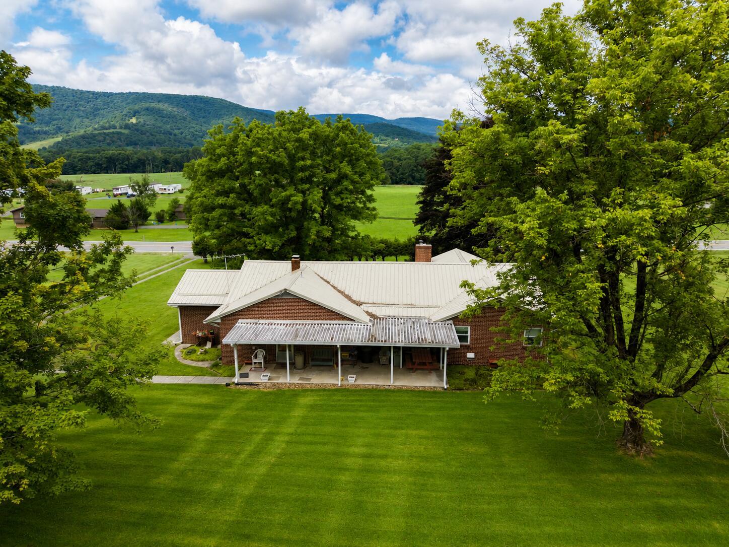 Image 2: aerial back of home