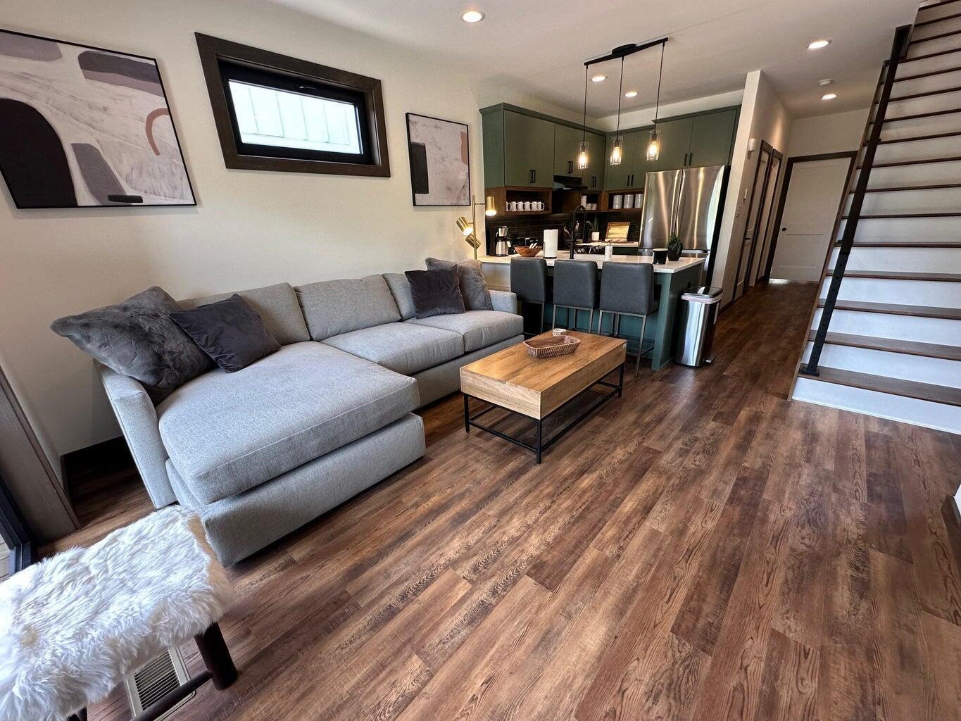 Image 3: Open living/dining/kitchen