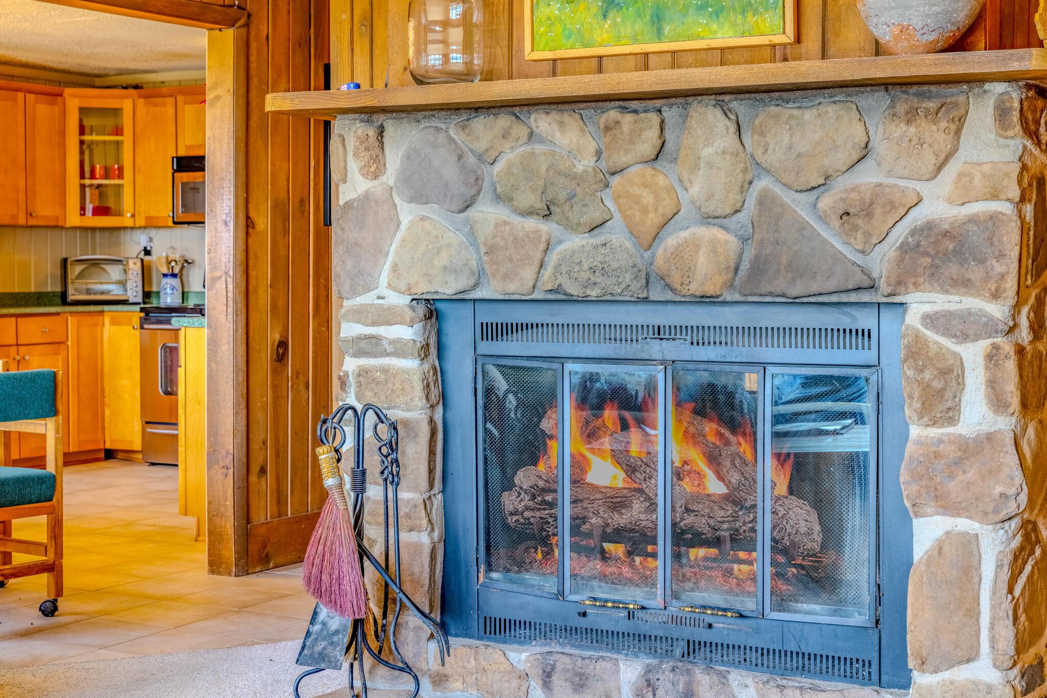 Image 3: Living room with wood fireplace