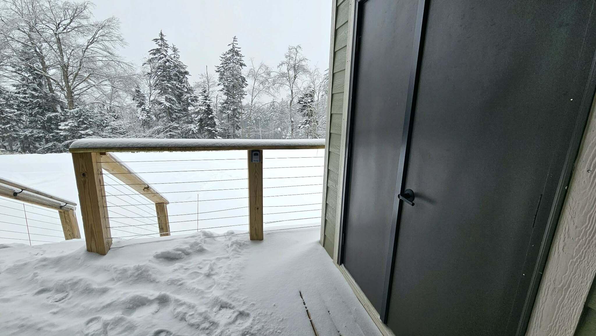Image 3: Front porch with storage closet