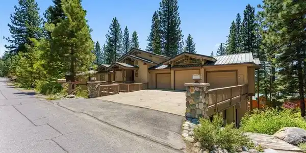 Image 2: Front of Home with oversized driveway