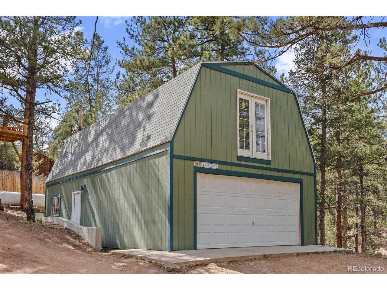 Image 2: two-story, heated and insulated garage with an upper-level bonus room which could be expanded into additional living space. Image 2: two-story, heated and insulated garage with an upper-level bonus room which could be expanded into additional living space.